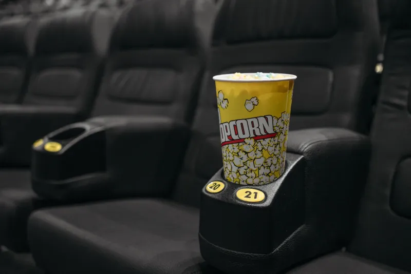 Recliners, Cocktails, and a Side of Fries: Why the Dine-In Theater Is Eating the Multiplex's Lunch